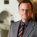 Dr. Russell James